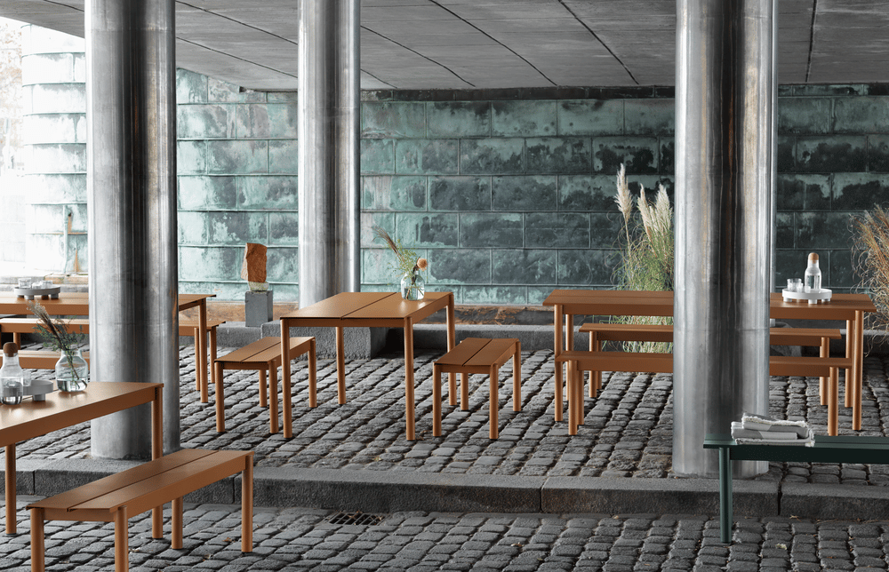 linear steel table bench burnt orange dark green silent platform corky