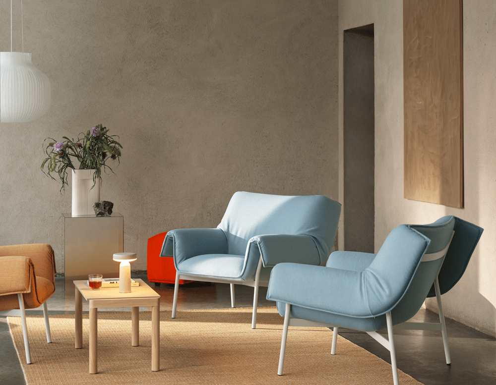 wrap-lounge-chair-hero-732-grey-fiord-451-grey-couple-coffee-table-wavy-sand-oak-ease-grey-echo-vidar-542-strand-o60-ply-burnt-orange-200x300-muuto-org