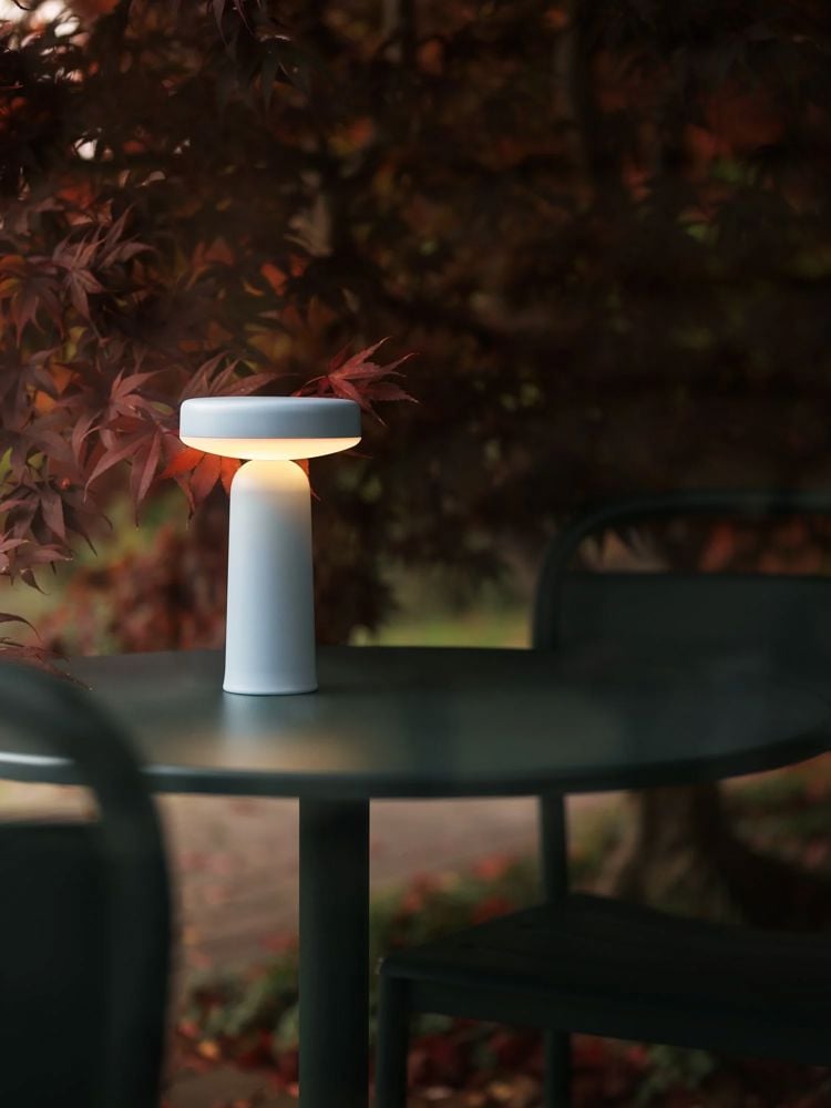 ease-portable-lamp-light-blue-linear-steel-dark-green-cafe-table-o70-side-chair-muuto-org