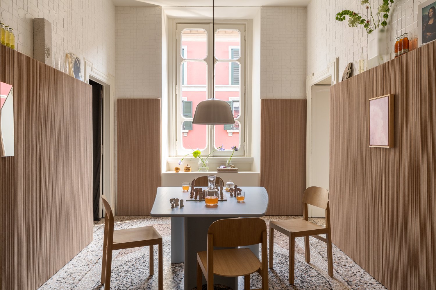 /cdn-cgi/image/width=1500,quality=85,format=auto/globalassets/content-media/images/stories/milan-apartment-2026/muuto-milan-apartment-2026-re-norm-table-workshop-chair-04.jpg